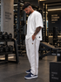 StrideX Relaxed Fit Track Pants (Cannoli Cream)